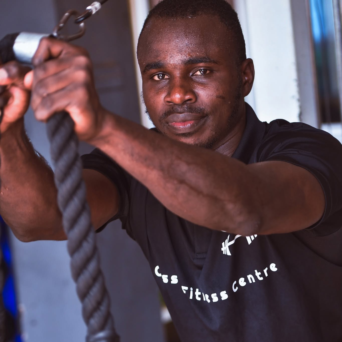 Adhérent au tirage à la corde, maillot CFC Fitness Centre
