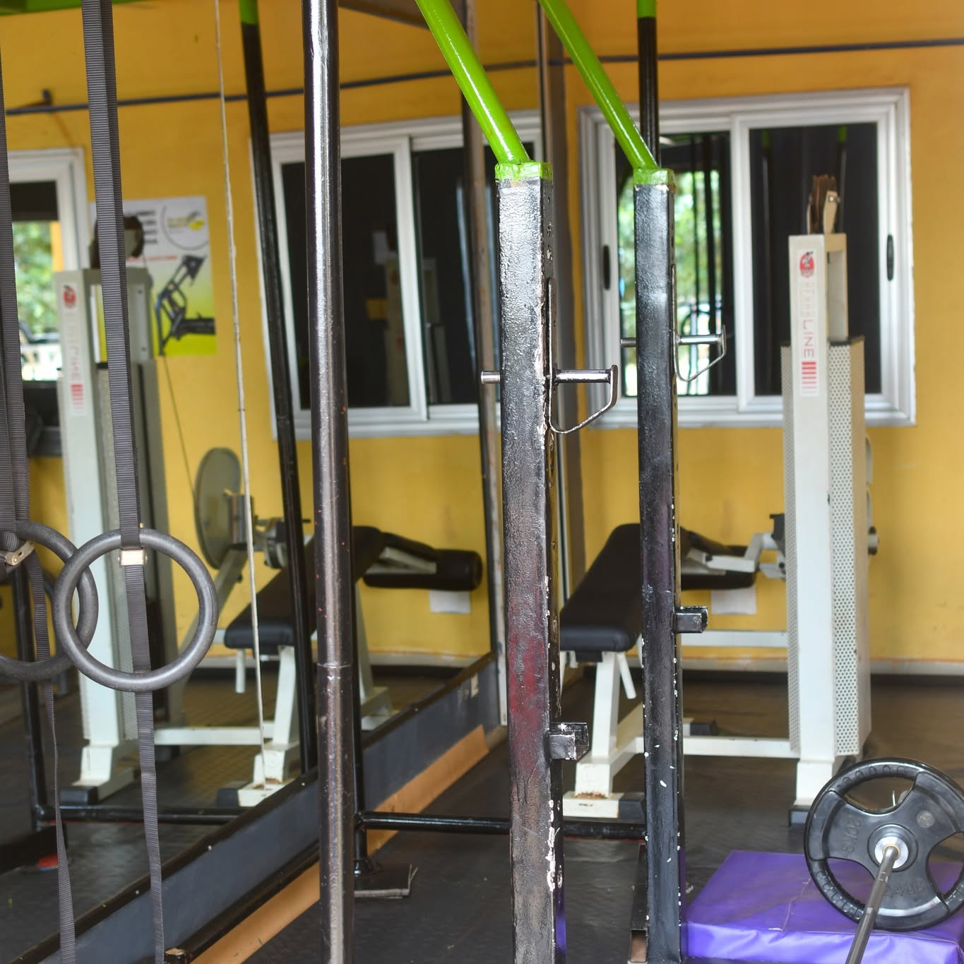Séance d'entraînement au Centre Fitness chez Cissé, Cissin